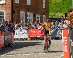Becky Storrie from CAMS-Basso crosses the finish line to take the solo win at Lincoln GP