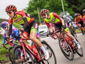 Danni Shrosbree and Sammie Stuart Racing bikes in the Women’s Tour